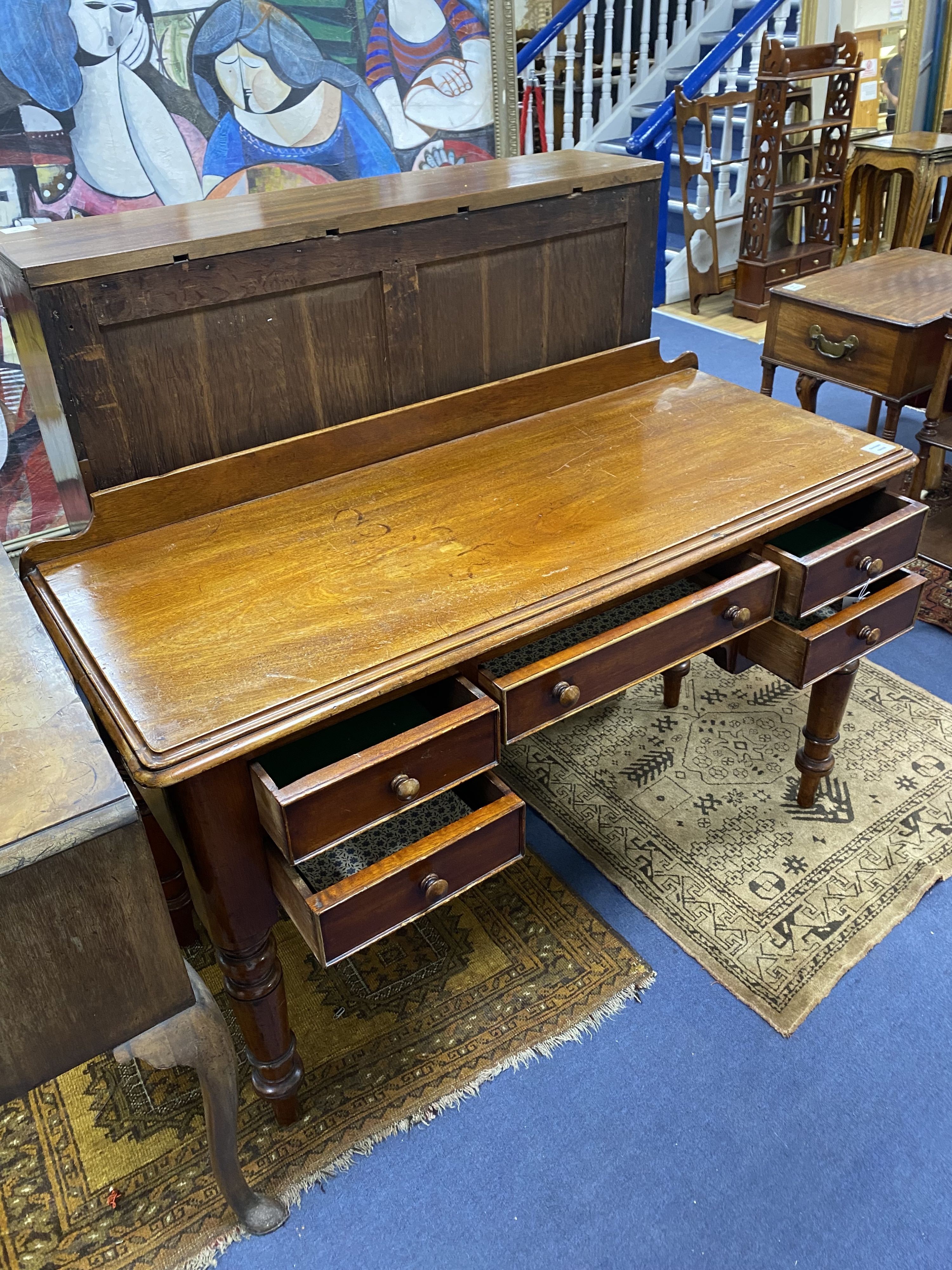 A Victorian mahogany kneehole dressing table, length 118cm, depth 48cm, height 76cm